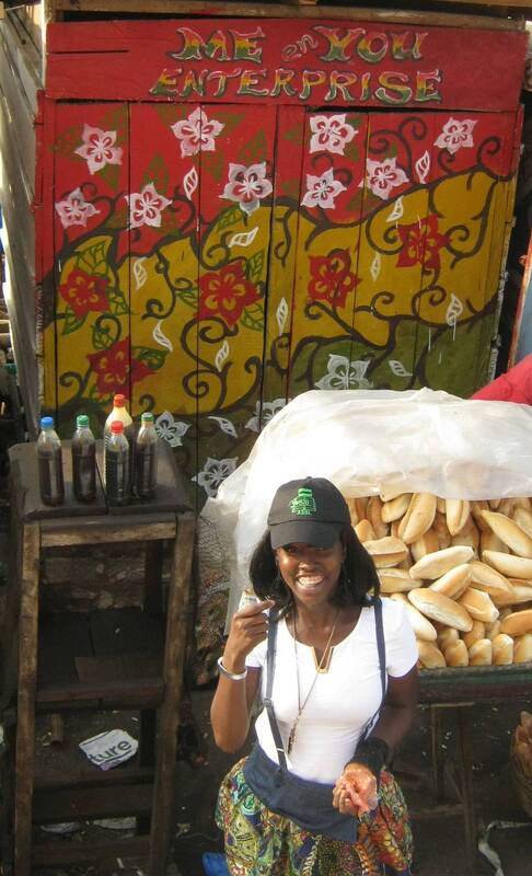 Smiling bread merchant, Freetown, Sierra Leone