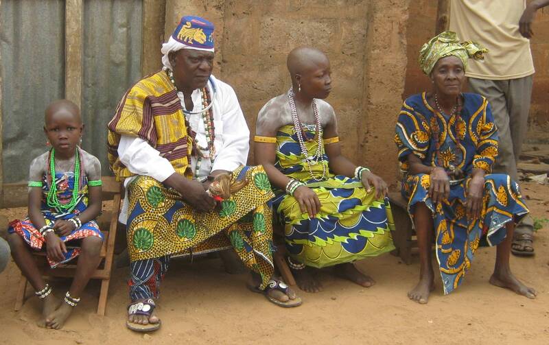 The chief, headwoman, priestess, and her adept, Benin